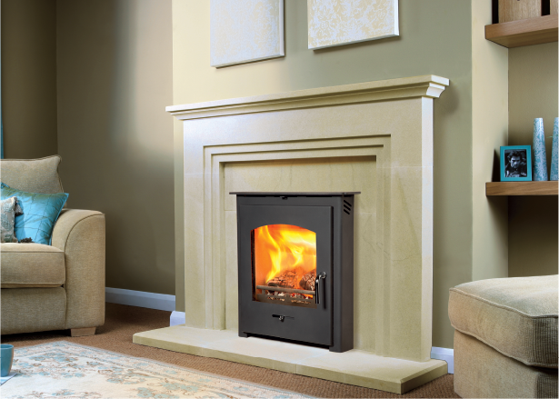 Bio-ethanol fire with glass surround installed on a white wall in a Cornwall lounge