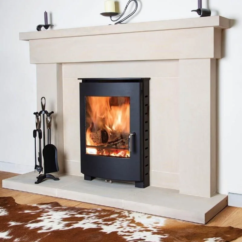 105 Eco inset stove fitted flush into chimney breast in Cornwall home