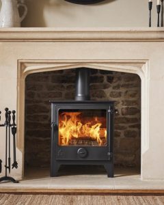 Dartmoor W5 Eco wood burning stove installed in Cornwall home with modern stone hearth