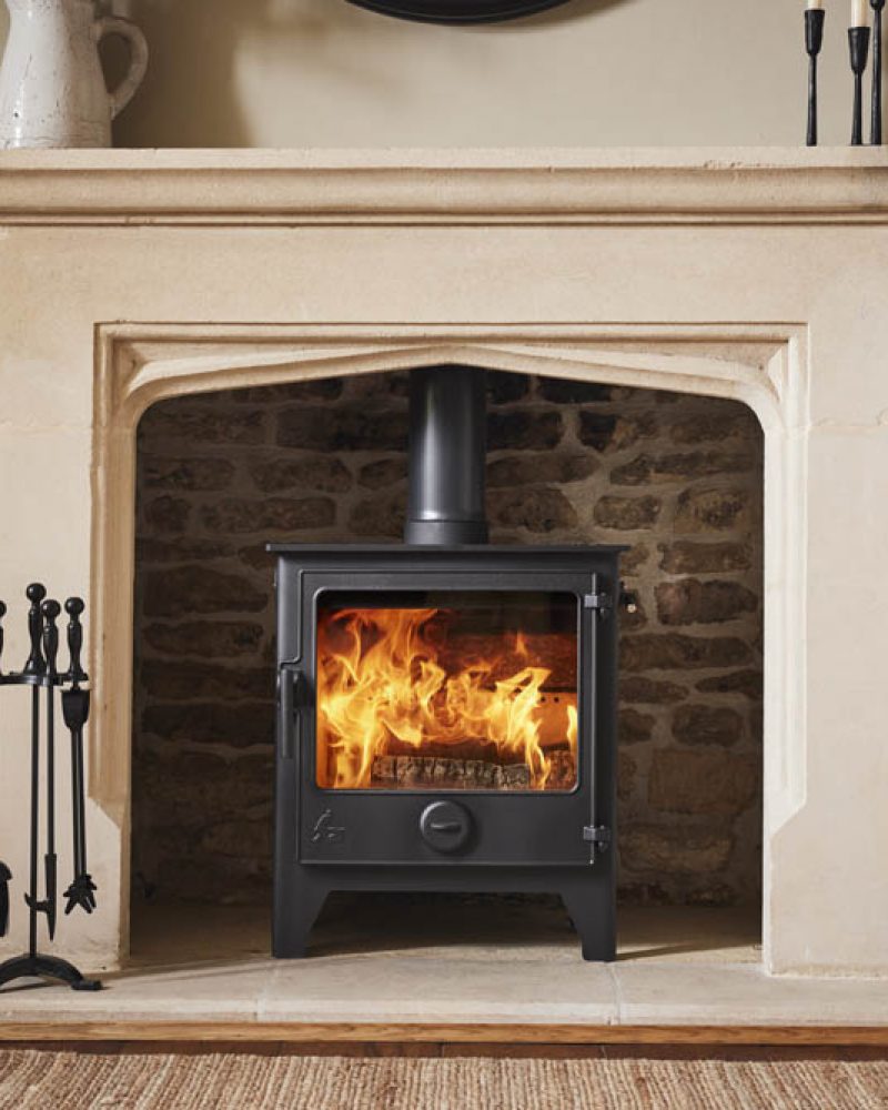 Dartmoor W5 Eco wood burning stove installed in Cornwall home with modern stone hearth