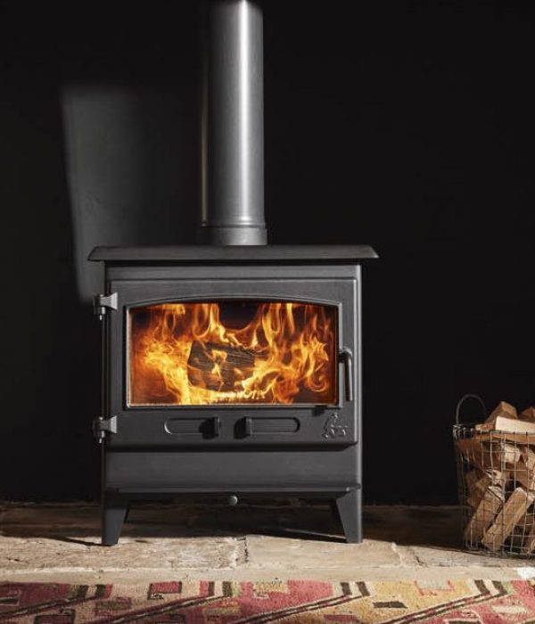 Dean Forge Croft 8 wood burner with stone surround in Cornwall property